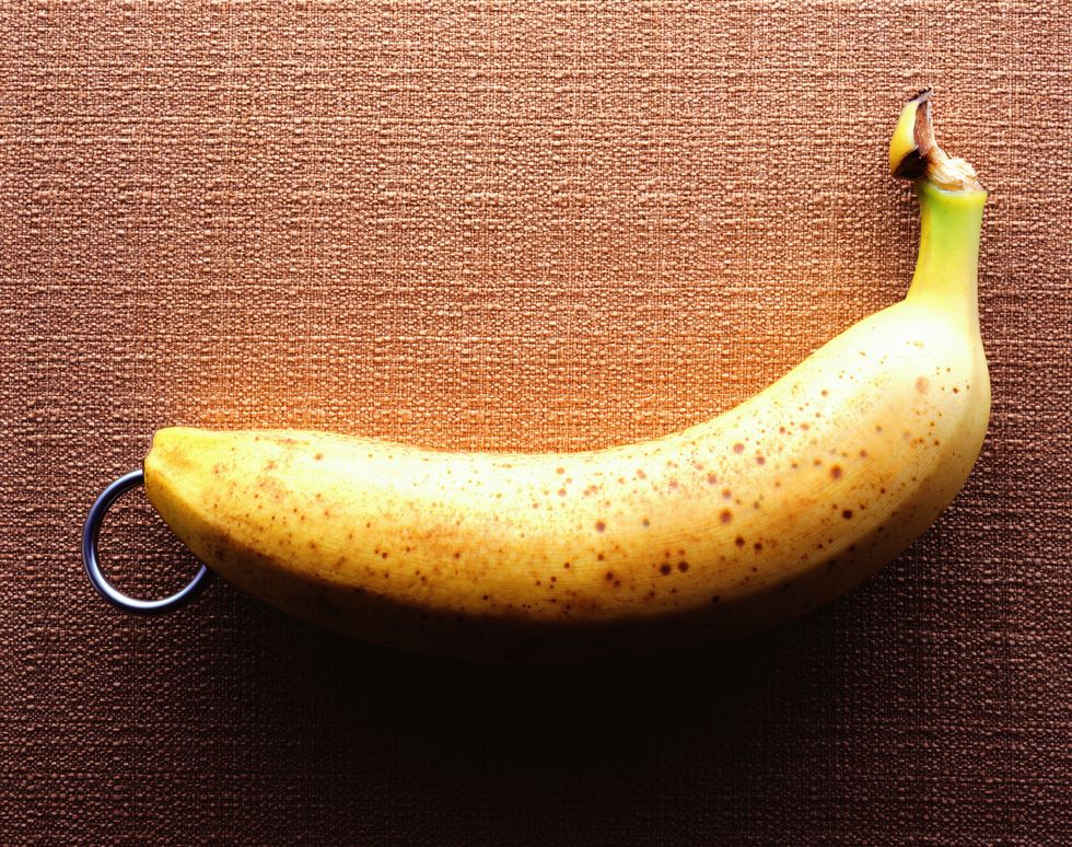 banana-pierced-with-earring-high-res-stock-photography-1573049570.jpg